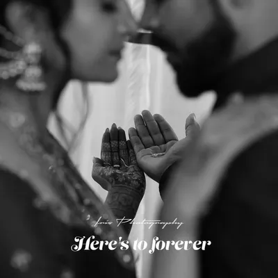 A black and white version of the "Here's to forever" shot, which gives the moment a timeless, classic, and emotional feel.
