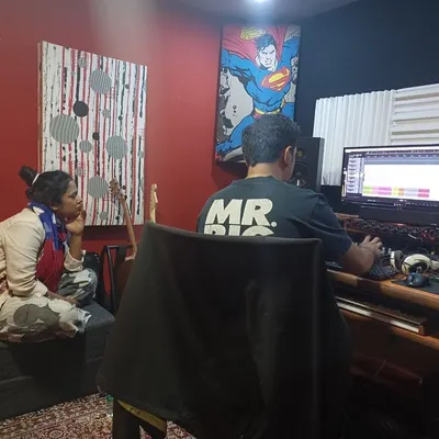A candid shot from a joyous recording session. Making music on a rainy day with talented artists is the best way to spend time.