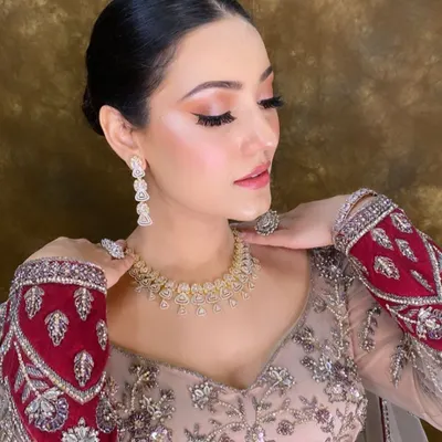 This close-up shows the precision of my HD makeup application. Notice the seamless foundation, the sharp winged liner, and the soft, blended contour.