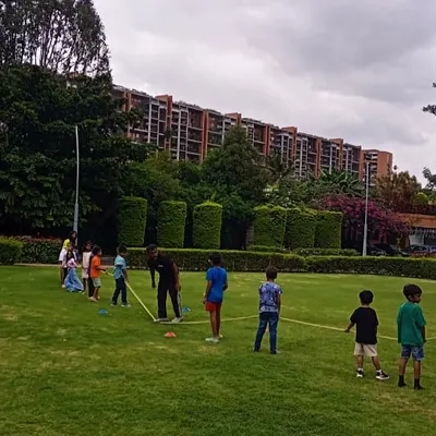 It's team versus team in a classic game of tug-of-war on a lush green lawn. This game is always a highlight of our outdoor parties.