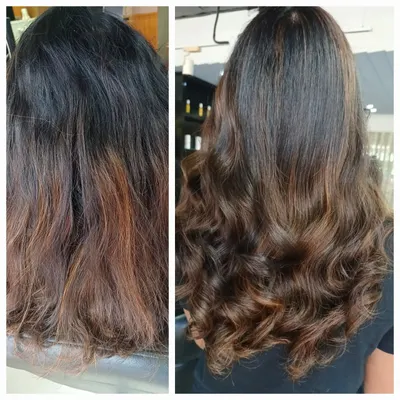 Another example of a successful color correction on hair with a history of dark dye and pre-lightening. The final result is a seamless blend of warm brown tones with subtle highlights, styled into soft waves to show the dimension.