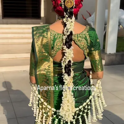 This bride is wearing one of my signature Thai-pattern shelas. I weave each jasmine bud by hand to create this intricate floral shawl, a truly special accessory for a wedding day.