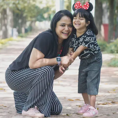 An outdoor park setting is perfect for capturing genuine moments of joy. My goal in a family lifestyle session is to create a fun atmosphere where you can forget the camera and just enjoy being together.