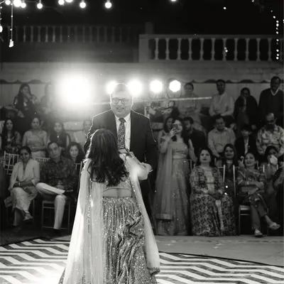 A timeless father-daughter dance. We capture these emotional, black and white moments during the Sangeet that you will treasure for a lifetime.