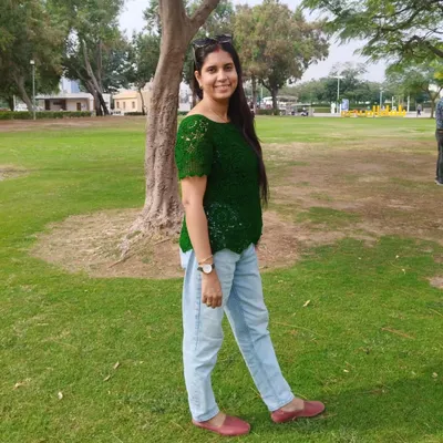 Here I am, wearing my favorite green lace top. It’s so comfortable and versatile, I love pairing it with simple jeans for a casual day out. It’s proof that handmade can be both elegant and effortless.