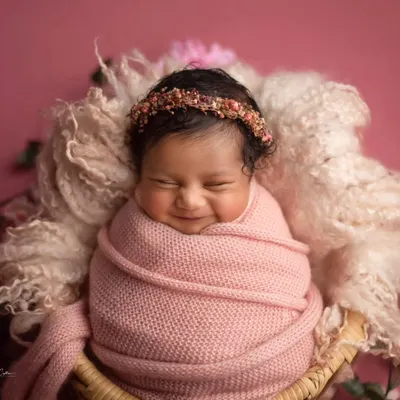 This is pure happiness. Capturing a big, cheesy grin like this is what makes my job the absolute best. This little girl's smile just melts my heart.