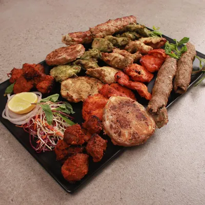 Can't decide what to order? Our non-veg platter is the perfect solution, featuring a delicious assortment of our best kebabs and tikkas.