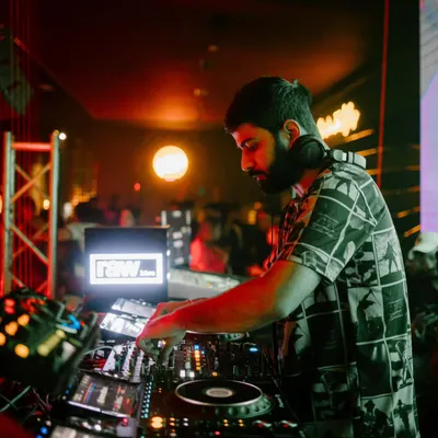 A close-up shot from a gig at Soho Delhi. Even in the middle of the mayhem, there's a deep focus required to keep the groove locked.
