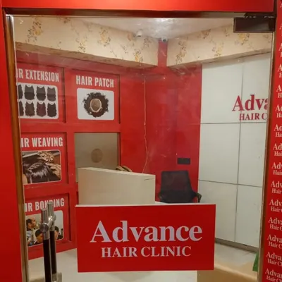 This is the entrance to my clinic. I've clearly displayed the different non-surgical services I offer, including hair extensions, hair patches, and hair bonding.