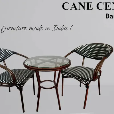 This is a compact outdoor set, including two chairs and a small glass-top table, perfect for a small balcony or patio. The synthetic weave is designed to withstand the elements while maintaining its look.