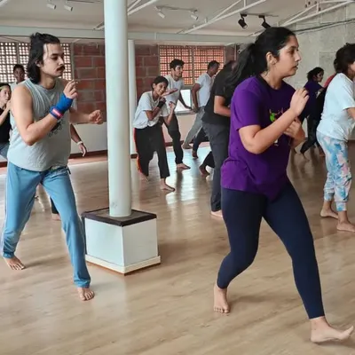 This is where it all begins. A group of beginners learns the basic Ginga stance, the foundation of all Capoeira movement. We make sure everyone feels comfortable and confident.