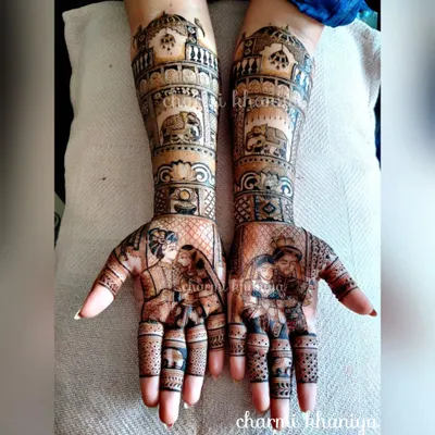 A full bridal story in henna! This design features beautiful portraits of the bride and groom, set against a backdrop of royal elephants and palace architecture. Every detail is handcrafted to tell their unique story.