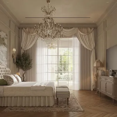 A view of the master bedroom showcasing the elegant drapery and classic furniture. The design balances a grand, tufted headboard and crystal chandelier with the simple, clean lines of the television console, blending opulence with functionality.