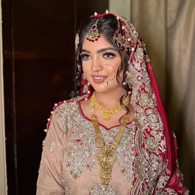 Enhancing the beauty of my Nikah bride, Saima, with a perfect blend of elegance and cultural charm. The look features a classic winged liner and radiant skin.