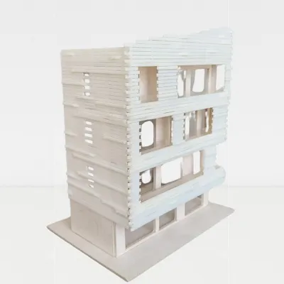 Physical models are an integral part of our design process. This model allows us to study the building's form, facade articulation, and the play of light and shadow in a tangible way that drawings cannot capture.