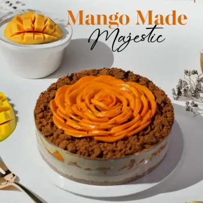 If mangoes had a dream, it would be this cake. We craft this majestic dessert with a beautiful mango rose, real Alphonso chunks, and a crunchy crumble base.