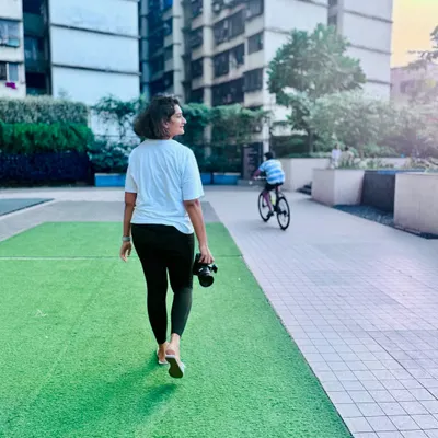 This is me in my element, camera in hand. I vibe differently when I'm ready to make memories. My commitment is to capture good candids, focusing on your family's unique energy and vibe.