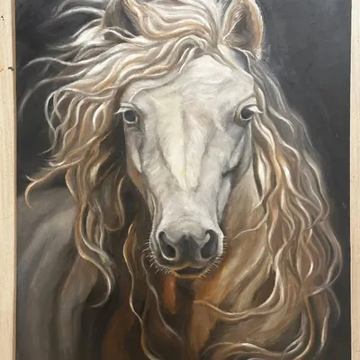 This beautiful oil painting by artist Sandipa captures the wild spirit of a white horse with a flowing mane. The dark background makes the subject stand out, highlighting the incredible detail and texture.