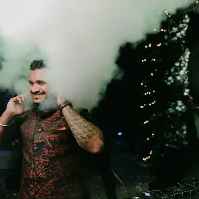 It's not just about playing songs; it's about performance. Capturing the right moment and using effects like this CO2 blast creates a peak experience that guests will remember long after the party ends.