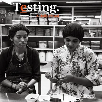 Tasting and testing is a daily ritual in our kitchen. Here, our team members are conducting a sensory analysis of a new batch to ensure it meets our quality standards.