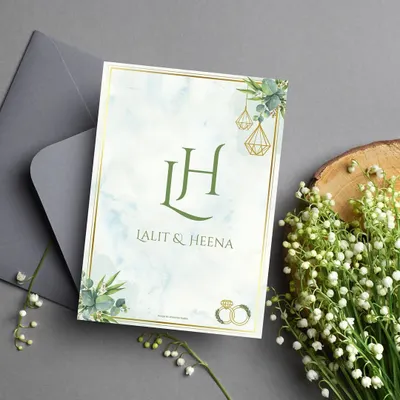For a subtle and minimal aesthetic, I designed this greenery themed wedding invitation. The clean design features the couple's 'LH' monogram, a soft watercolor background, and delicate eucalyptus illustrations for a fresh, organic feel.