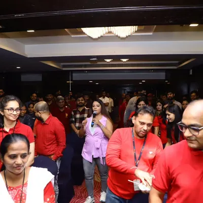 Interacting with the crowd during the Infosys Finacle Day 2025. This was a hybrid event where I engaged with the in-person audience in Mumbai while also addressing the global team watching the live stream from Bangalore.