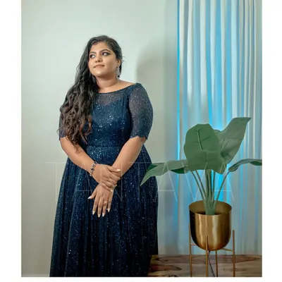 Our gorgeous bride Sincy in a classy navy blue sequins gown for her cocktail night. The boat neck and fitted sleeves create a sophisticated and elegant silhouette.