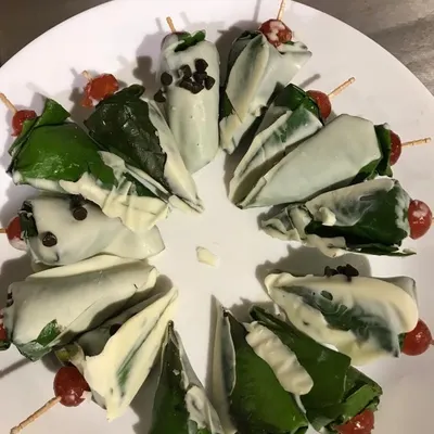 A creative fusion dessert that always surprises and delights guests. This is my chocolate-dipped paan, garnished with a cherry. It’s a perfect example of how I blend traditional Indian flavours with contemporary presentation for a unique catering experience.