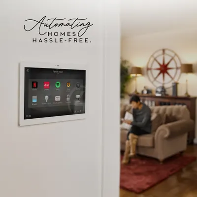 I make home automation hassle-free by centralizing control. This wall-mounted touch panel provides a single point of access for all your home's integrated systems, from entertainment like Netflix and Spotify to lighting and climate.