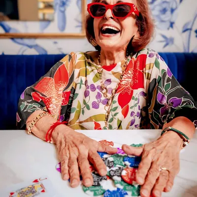 A shot from a high-energy lifestyle campaign I styled for a patisserie. We created a "granny-core" themed poker night, using bold prints, colorful accessories, and playful props to capture a feeling of fun and joyful chaos.