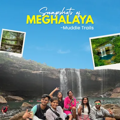 Snapshots of Meghalaya. Posing with the group in front of a majestic waterfall. I plan trips that take you to these stunning natural wonders, perfect for your next profile picture.
