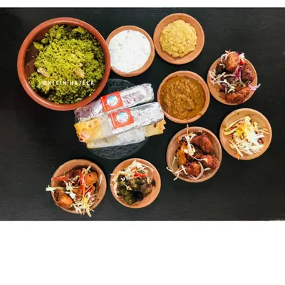 This beautiful spread shows the variety I offer. It features our Thuppangadi Biriyani, several types of kebabs, and of course, our signature rolls. It’s a feast that tells the full story of my kitchen.