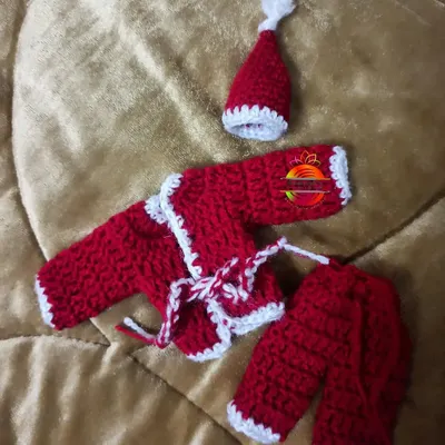 A special custom order I was happy to make: a tiny Santa Claus outfit for a 'Kanhaiya' or Lord Krishna idol. The set includes a little jacket, pants, and a Santa hat, all crocheted in festive red and white.