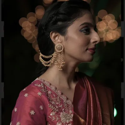 When a Bahubali earring speaks in volume. A model showcases our lightweight, multi-chain Bahubali earrings, perfect for a bridal shoot or a grand wedding.