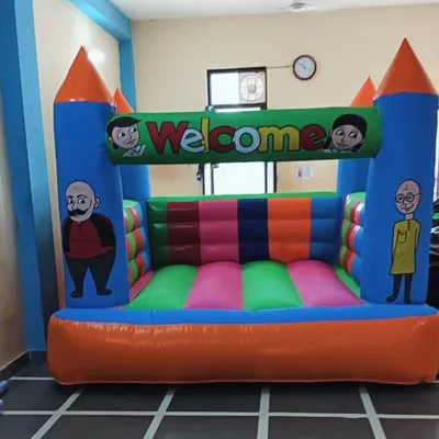 An 8x8 foot jumping bouncy with a "Welcome" banner and cartoon characters. Its compact size makes it suitable for indoor use or small outdoor spaces.