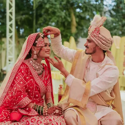 A tender moment between the bride and groom during their wedding ceremony. I look for these small, intimate gestures that show the deep connection between a couple.
