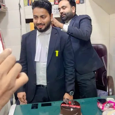 A significant milestone: my band ceremony with Team F 225. My mentor, Guru ji Adv. Arif Liyaquat, does the honors. This marks a formal step in my journey as an advocate.