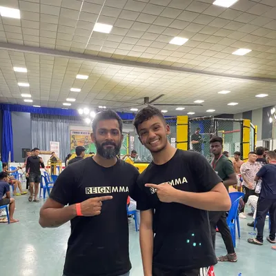 A proud moment with my student Almeer after his first MMA fight and first win. He was developed entirely using my ecological training methods, proving that a focus on skill and trusting the process leads to inevitable success.