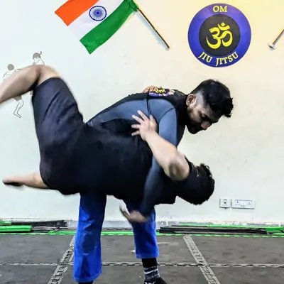 A clean hip toss in action. This wrestling takedown is a perfect example of how we blend different grappling arts to create a complete system for MMA and self-defense.