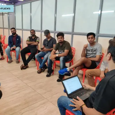 The foundation of a great tournament is clear communication. Here, I am conducting a briefing session with team managers for a corporate championship, ensuring everyone understands the schedule and rules.