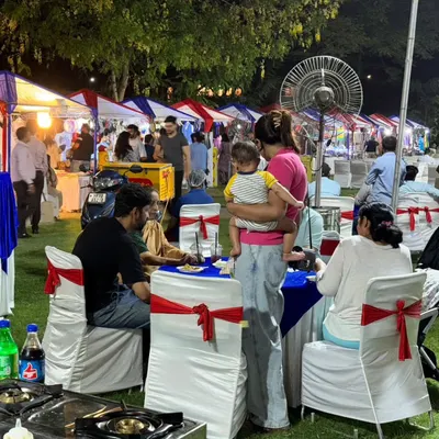 We cater to all types of outdoor events, like this family day at Heritage City, Gurgaon. Our team sets up comfortable seating and live food counters to ensure guests have a wonderful and relaxed time.
