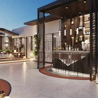 The centerpiece of this party terrace is a sleek, modern bar with integrated lighting and a pergola. It's designed to be a social hub, perfect for hosting guests and enjoying evenings outdoors.
