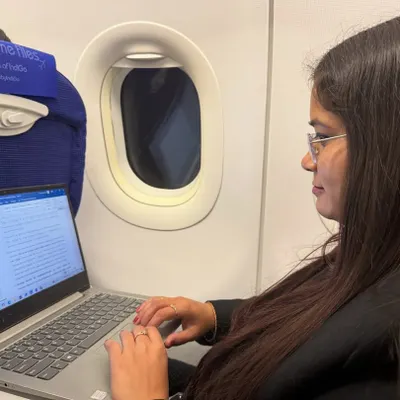 Work doesn't stop, even at 30,000 feet. Preparing for a case while in flight.