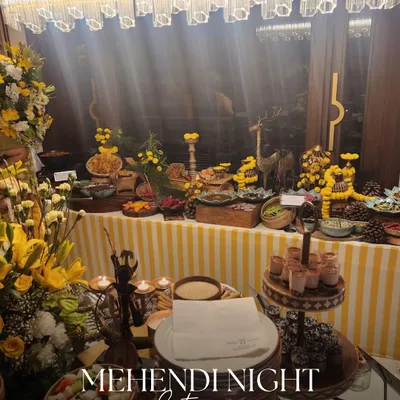 For this Mehendi night, we created a vibrant yellow-themed buffet that matched the festive decor. The spread included a variety of appetizers and main courses for guests to enjoy.