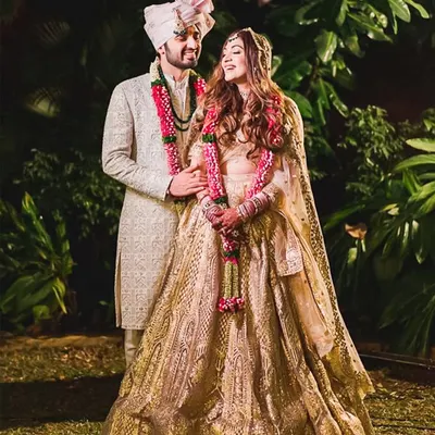 A moment of regal beginnings. I handcrafted this classic cream sherwani with all-over embroidery, creating a look of timeless elegance for the groom.