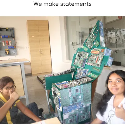 We don't just make things, we make statements. Here, students repurposed old electronic circuit boards to create a functional chair, a powerful statement on sustainability and design.
