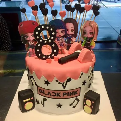 For the K-Pop fans, this Blackpink-themed cake features chibi character toppers, a fondant microphone, and musical notes. It's the perfect cake for a Blink's birthday celebration.