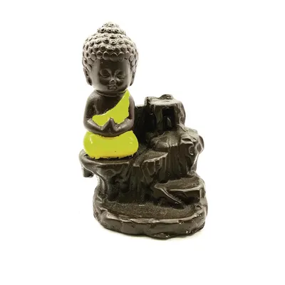 This is our Smoke Buddha backflow incense burner. When you place a special backflow incense cone on top, the smoke gently flows downwards like a waterfall, creating a stunning and meditative visual effect.