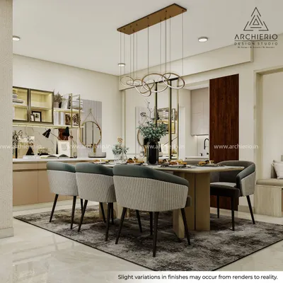 This dining area is a statement of refined living, where a modern chandelier and comfortable seating come together. The adjoining crockery unit adds both storage and a display element, blending seamlessly with the kitchen.