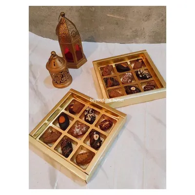 My chocolate-stuffed dates are a huge hit, especially during Ramadan and Eid. I use premium dates and fill them with delicious options like hazelnut or Biscoff, then top them with nuts and chocolate drizzles. They are presented in this elegant gold box, making them a perfect gift for the season.